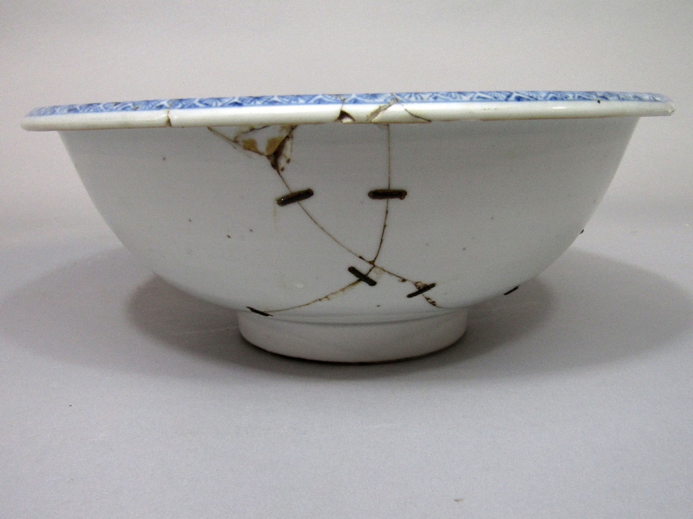 A 19th century oriental bowl with famille rose painted decoration of male characters in a - Image 4 of 4