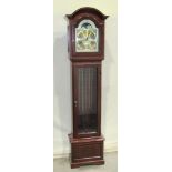 A contemporary reproduction small longcase or grandmother clock with arched hood and dial with