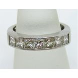 Platinum seven stone princess cut diamond ring, each stone 0.20cts approx, size L with resizing bar,