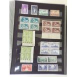 A stockbook containing a very large accumulation of Mint stamps from France including blocks, part