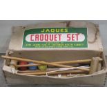 A Jaques croquet set housed within its original pine and cardboard box