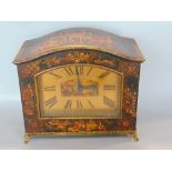 Chinoiserie cased brass dial arched mantel timepiece, the case with relief overlay, the dial