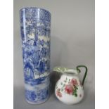 A late 19th century oriental blue and white vase/stickstand of cylindrical form, blue and white