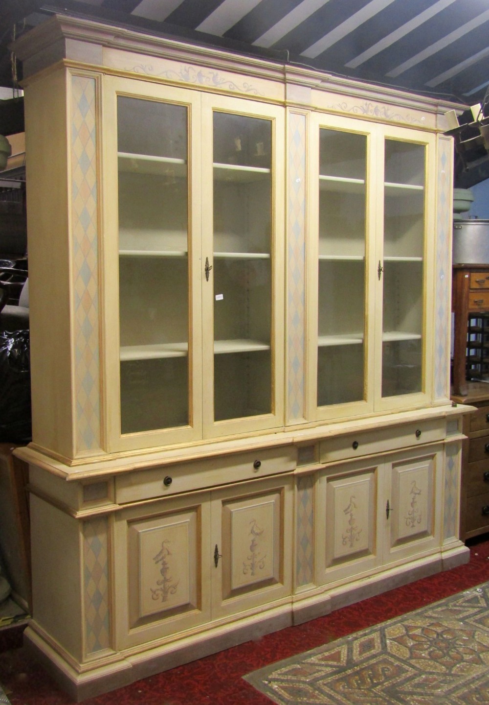 A substantial contemporary but Georgian style two sectional side cabinet or bookcase, the upper