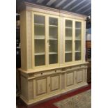 A substantial contemporary but Georgian style two sectional side cabinet or bookcase, the upper
