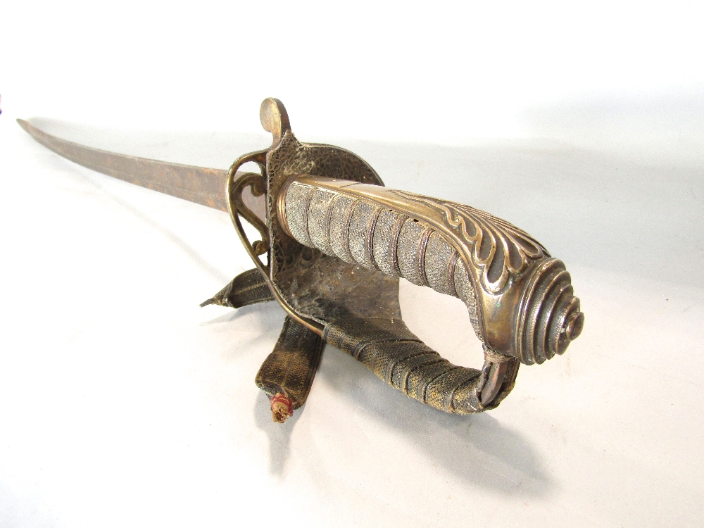 A Victorian officers sword with pierced detail, shaped leather guard, the blade engraved ( in need - Image 3 of 3