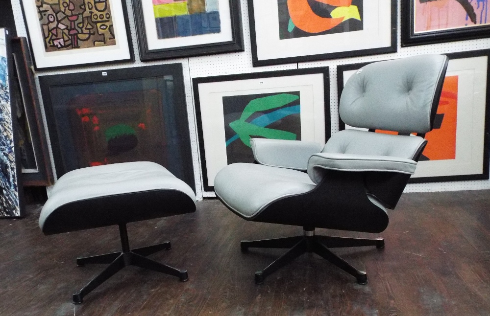 After Charles and Ray Eames - bespoke lounge chair and footstool, with grey leather upholstery upon