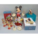 Collection of Disney figures including Lenox ' Flying high with Mickey' and 'the Disney Carousel