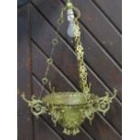 A cast brass chain-link hung ceiling light with scrolling foliate detail