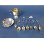 A mixed silver golfing lot to include a collection of enamel crested spoons, Daily Telegraph