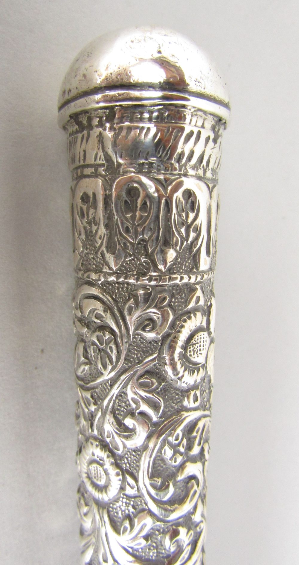 Victorian parasol with embossed Indian silver handle with scrolling and other detail - Image 2 of 3