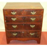 A countrymade chest of three long and two short drawers, in mixed woods, on bracket supports, 82cm