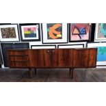 A. H. McIntosh of Kirkcaldy - long sideboard with two central cupboard doors flanked by three