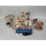 A collection of silver plated ware including a four piece Viners tea service, two handled tray, a