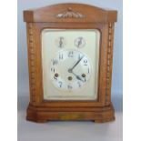 Early 20th century oak case boardroom clock, the three train silver dial with silver chapter ring