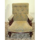 A Victorian drawing room chair with later floral pattern upholstered seat, buttoned back and arms,