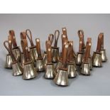 A set of twenty two hand bells, fairly recently refurbished with new leathers, mufflers, etc