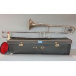 A Boosey & Hawkes silver plated trombone - The Regent B6 tenor with mute, sheet music clip, etc,