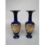 A pair of blue ground Royal Doulton Slaters patent vases, with impressed mark to base, 35cm approx
