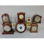 A collection of various mantel clocks to include torsion examples, Commeti, Smiths and others (8)