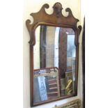 A good quality reproduction Georgian style wall mirror, with moulded walnut veneered frame and