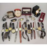 A box containing a collection of various vintage watches and timepieces to include Buler 21 jewels