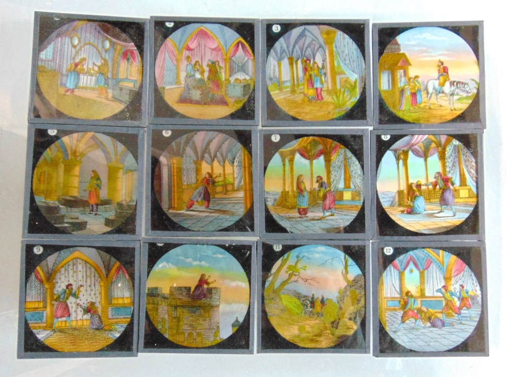 A collection of magic lantern slides, including a set of twelve coloured examples - The Elephants - Image 3 of 4