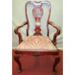 A substantial 19th century open armchair in the 18th century manner with crimson lacquered framework