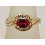 14ct ruby and cubic zirconia crossover dress ring, size T, 3.6g