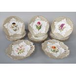 A collection of 19th century dessert wares with painted botanical sprays within a pale grey and gilt