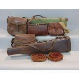 A collection of vintage gun cases including a leg of mutton example, canvas and leather case