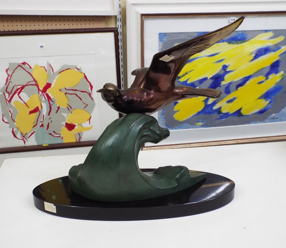 Art Deco gilt and verdigris spelter character group of a flying bird on a wave, upon an oval - Image 3 of 4