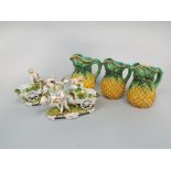 A set of three 19th century Copeland majolica jugs modelled as pineapples, max height 21.5cm approx,