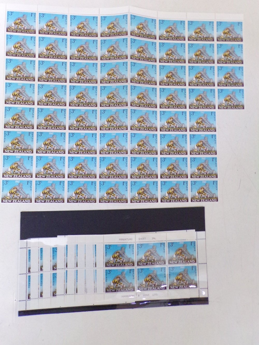 A sheet folder of New Zealand and Australia Minisheets, full sheets and part sheets