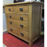 A good quality contemporary oak bedroom chest of two short over three long drawers, 100cm wide