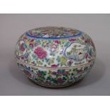 An oriental bowl and cover of circular form with polychrome painted decoration of figures,