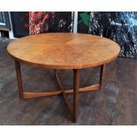 A. H. McIntosh of Kirkcaldy - Teak 'Sunburst' coffee table, the circular top upon tapered legs