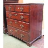 A small Georgian mahogany chest of three long and two short graduated drawers, raised on bracket
