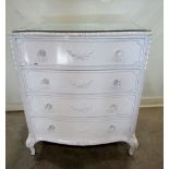 A bedroom chest, the serpentine front fitted with four long drawers, with painted finish and