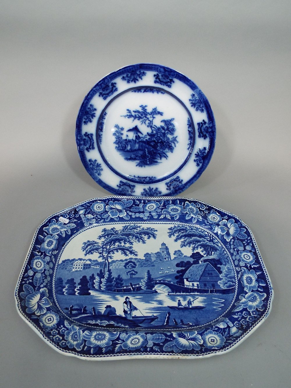 A 19th century blue and white printed meat plate in the Newnham Courtney pattern, 53.5cm, together