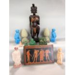 A box of worldwide artefacts including a carved African hardwood figure of a kneeling female, a pair
