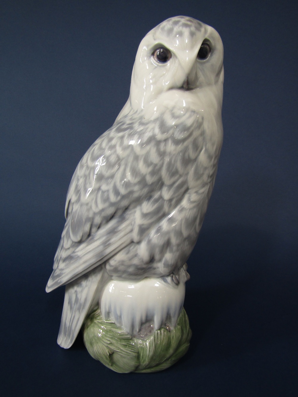 A large Royal Copenhagen model of a snowy owl with printed and painted mark to base no 1829, 39.