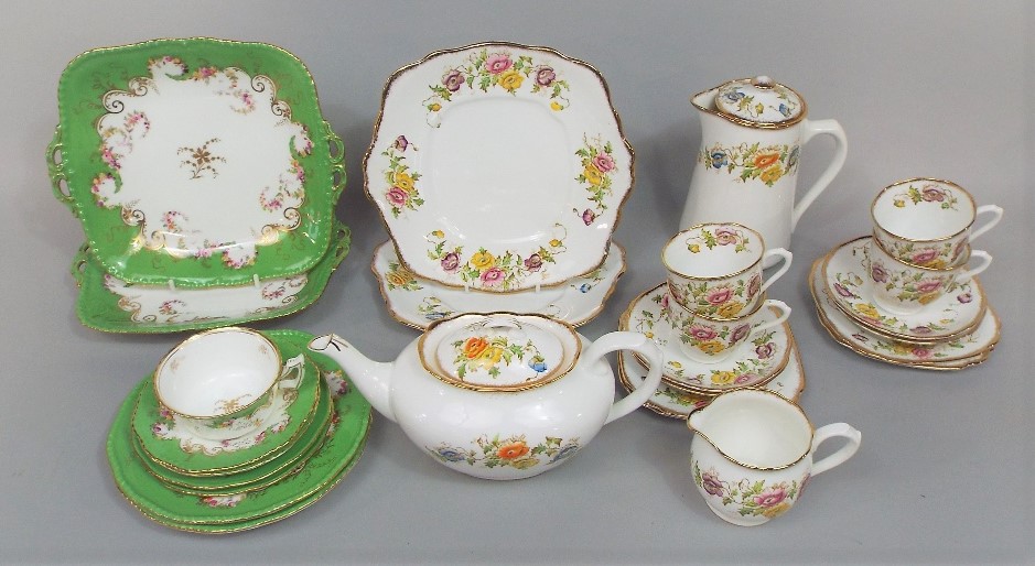 A collection of Royal Albert Crown China teawares including teapot, pair of cake plates, hot water