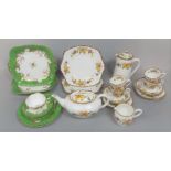 A collection of Royal Albert Crown China teawares including teapot, pair of cake plates, hot water