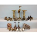 A collection of eastern wares including two bronzed figures of a pig and a rat, both with baskets,