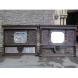 A pair of 19th century overmantels, the profusely carved oak frames with lions mask bosses, part