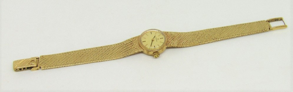 Ladies 9ct Omega cocktail watch the gilt dial with baton markers upon original Omega mesh