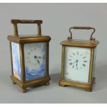 Brass and enamel carriage timepiece the front and side panels with blue and white landscape