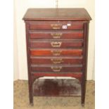 A Windsor stained and beechwood lathe back armchair, together with an Edwardian walnut sheet music