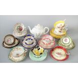 A collection of decorative cups and saucers to include Paragon, Aynsley, etc